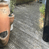 The paved area before we began work was overgrown and unappealing