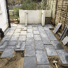 Mid build showing the paving slabs being laid