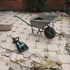 This shows us beginning work to remove the existing patio